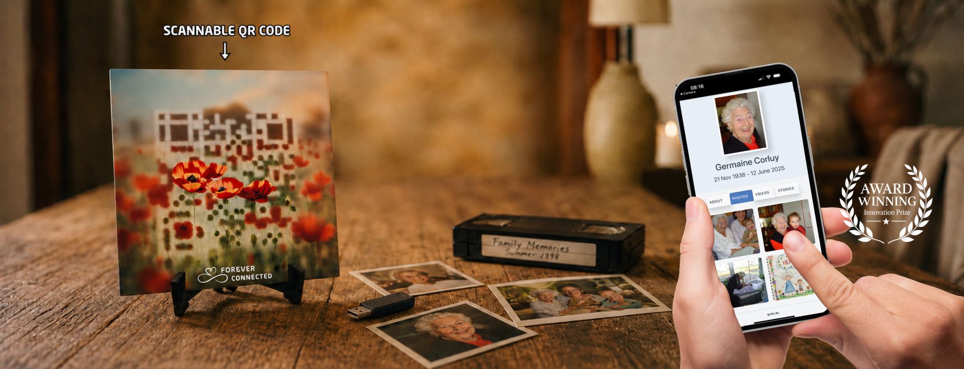 Scattered Memories of photos, vhs video, mobile phones grouped onto a QR code plaque with red poppies design and linked to an online tribute