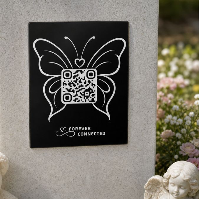 Forever Connected butterfly QR memorial plaque for an angel baby, attached to a headstone and linking to an online memorial page with precious memories