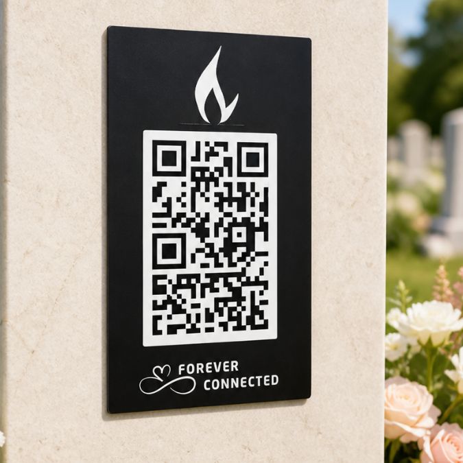 Forever Connected candle QR memorial plaque on a headstone, opening an online tribute page that keeps a loved one’s story and memories alive
