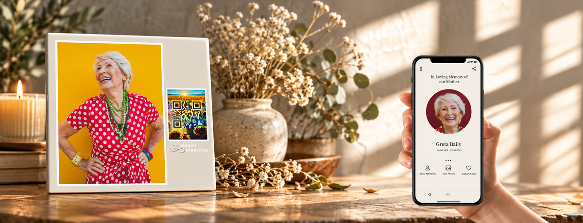 Memorial photo plaque with sunflowers and sunset QR design beside a smartphone showing a Forever Connected remembrance page. A unique digital memorial object helping families honor loved ones and keep memories alive online.A modern grief support object to preserve memories of a loved one.