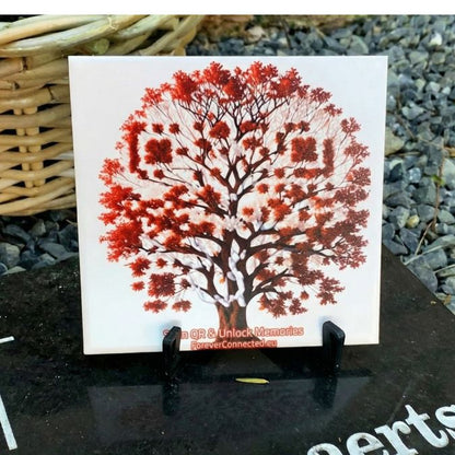 QR code ceramic tile on a grave, connected to an online digital memorial
