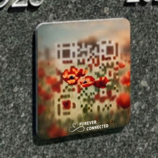 Forever Connected Red Poppies QR memorial medallion on a grave headstone, scannable design linking to an online tribute page.